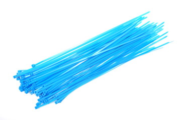 Obraz na płótnie Canvas blue cable tie on white background