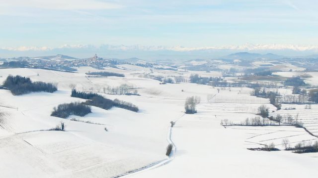 Aerial drone view of a snowy Monferrato