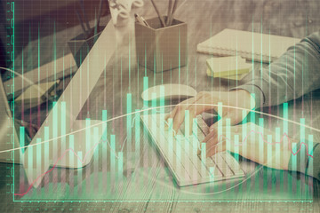 Double exposure of financial graph with man works in office on background. Concept of analysis.