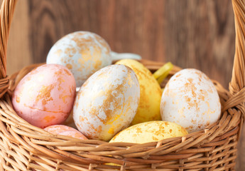 Easter background, easter eggs in a basket