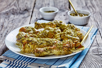 Pesto Chicken served on a white plate