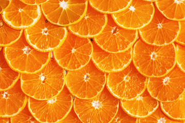 Citrus background. Lemon, orange lime, grapefruit mandarin. Harvest concept. Top view. Tangerine segments, orange background texture