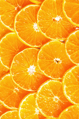 Citrus background. Lemon, orange lime, grapefruit mandarin. Harvest concept. Top view. Tangerine segments, orange background texture