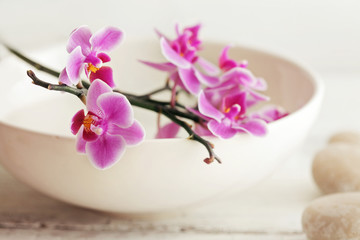 Naklejka na ściany i meble SPA still life - pebbles and orchid flowers