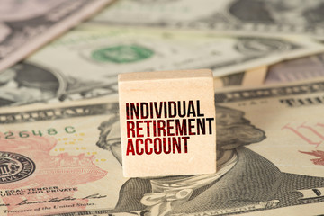 Dollar banknotes and IRA Individual Retirement Account