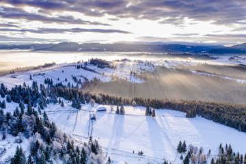 Pasul Tihuta, Romania seen from a drone early in a winter morning. 