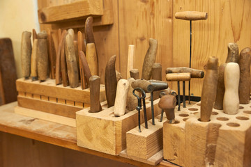 Fototapeta na wymiar Joinery. Woodworking. Carpenter's tools. Chisels in the workshop. Manufacture of wooden products. Carpentry training. Carving.