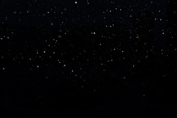 Fototapeta premium snow on a black background. snow texture
