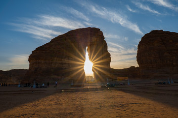 Tourists gather at the Elephant Rock geological site near Al Ula, Saudi Arabia