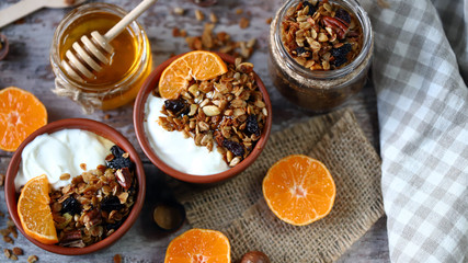 Selective focus. Healthy breakfast with granola and yogurt. Flat lay.