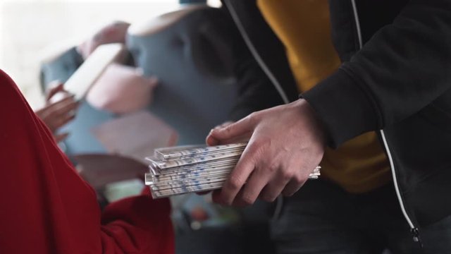 A Man Hands Out Flyers, Closeup