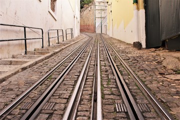 Fototapeta na wymiar Tram railway track in Lisbon, Portugal photo 