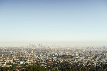 Naklejka na ściany i meble Panoramic view of LA downtown and suburbs from the beautiful Griffith Observatory in Los Angeles