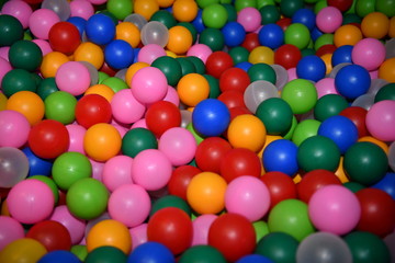 Fototapeta na wymiar colored balls and cubes for children's educational games in the children's play area