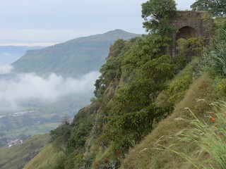 One of the Entrance doors of Ajinkyatara fort with adjoining valley and hills, at Satara,...