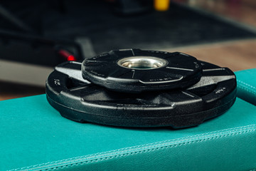 Weight plates in a gym, powerlifting equipment