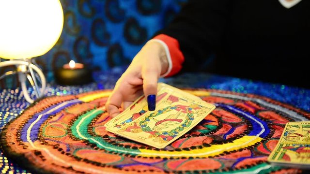 FLORENCE-ITALY-2020.1.25 Seer reads Tarot cards for horoscope