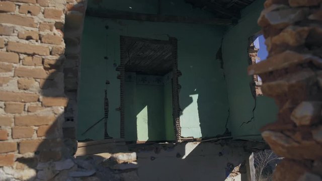 ruins of house after war attack or quake