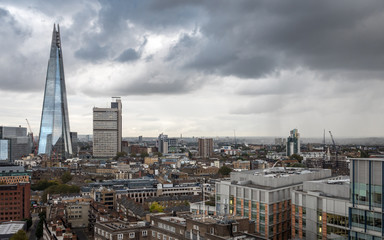 Fototapeta na wymiar South London skyline. An overcast view over Southwark dominated by the modern architecture of The Shard building.