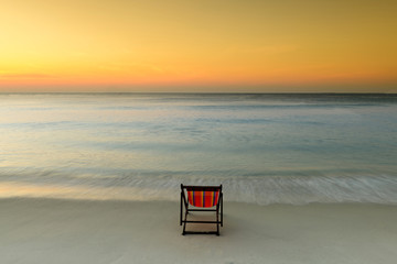 View of the tropical sea beach and loungers at sunrise. Samed island thailand