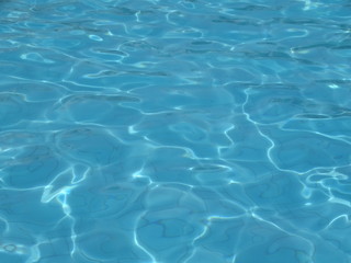 Fototapeta na wymiar blue water in swimming pool