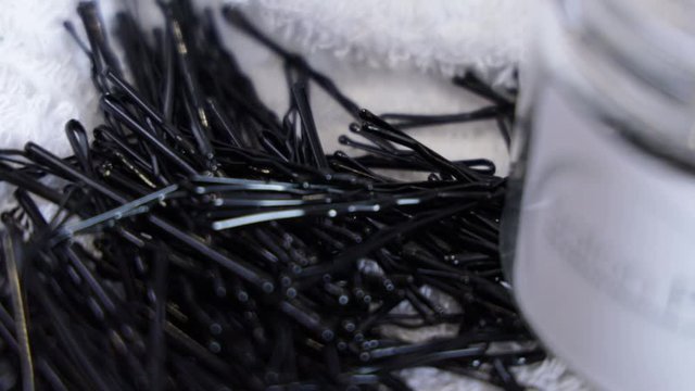 Close up of black bobby pins.