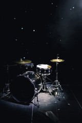 drum set on stage in a concert hall