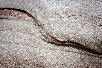 the wind in the seaside has blown sand