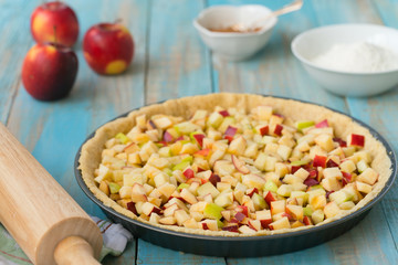 Home-baked lattice apple pie, in a baking dish.