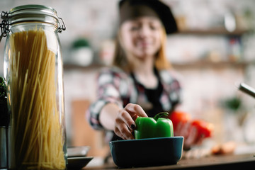 Little girl in kitchen. Cute girl cooking .