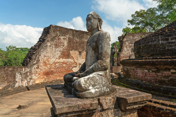 Buddha statue in ruins of the Vatadage  (round house of relics) at Polonnaruva, Sri Lanka