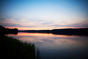 Obraz premium sunset over the lake