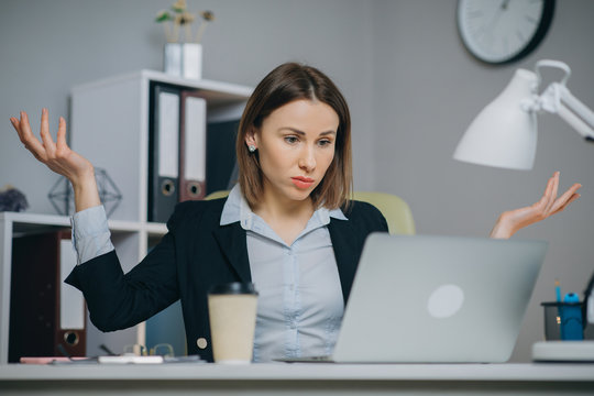 Business Woman Reading Bad News On Laptop Computer At Coworking Space. Upset Woman Closing Down Laptop In Office. Tired Woman Breathing Deep At Workplace. Business Woman Doing Yoga Exercise.