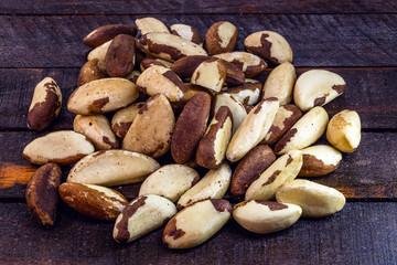 Obraz premium Brazil nut, shelled and shelled. Ingredient of Brazilian cuisine. Seed of Castanheira da amazônia. Space for text.