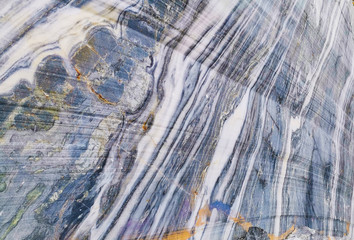 marble wall with blue wite and grey stripes on it. - Powered by Adobe