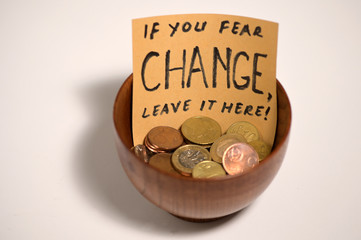 Bowl With Coins With Sign