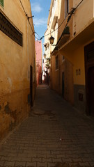 Obraz premium Bright landscape of Morocco, breathtaking curves of mountains, stunning combination of hills & farm land,inadvertent distribution of houses & huts, raw impression of pure nature.