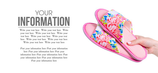 Female pink slippers in hand on white background isolation, copy space