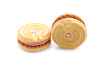 sandwich cookies with strawberry cream on white background