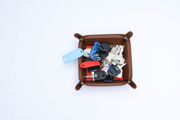 Bunch of locker keys isolated on white background