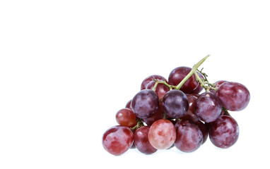 red grapes over white background