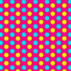 Pickle ball ball pattern. Blue and yellow balls on a pink background.