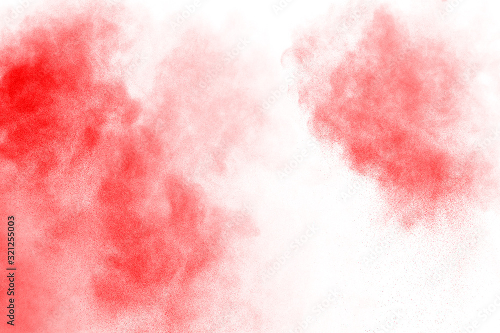 Wall mural Red powder explosion on white background. 