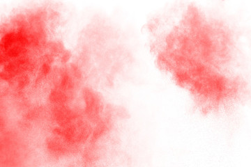 Red powder explosion on white background. 