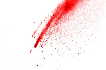 Red powder explosion on white background. Colored cloud. Colorful dust explode. Paint Holi.