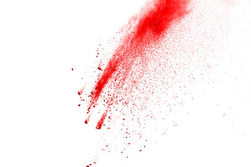Red powder explosion on white background. Colored cloud. Colorful dust explode. Paint Holi.