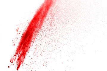 Red powder explosion on white background. Colored cloud. Colorful dust explode. Paint Holi.