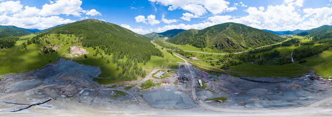 Aerial view 360 panoramic of opencast mining quarry minerals with many machinery tractors and...