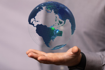 Hand Holding World digital 3d.