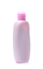 pink Plastic bottle of lotion isolated on white background
